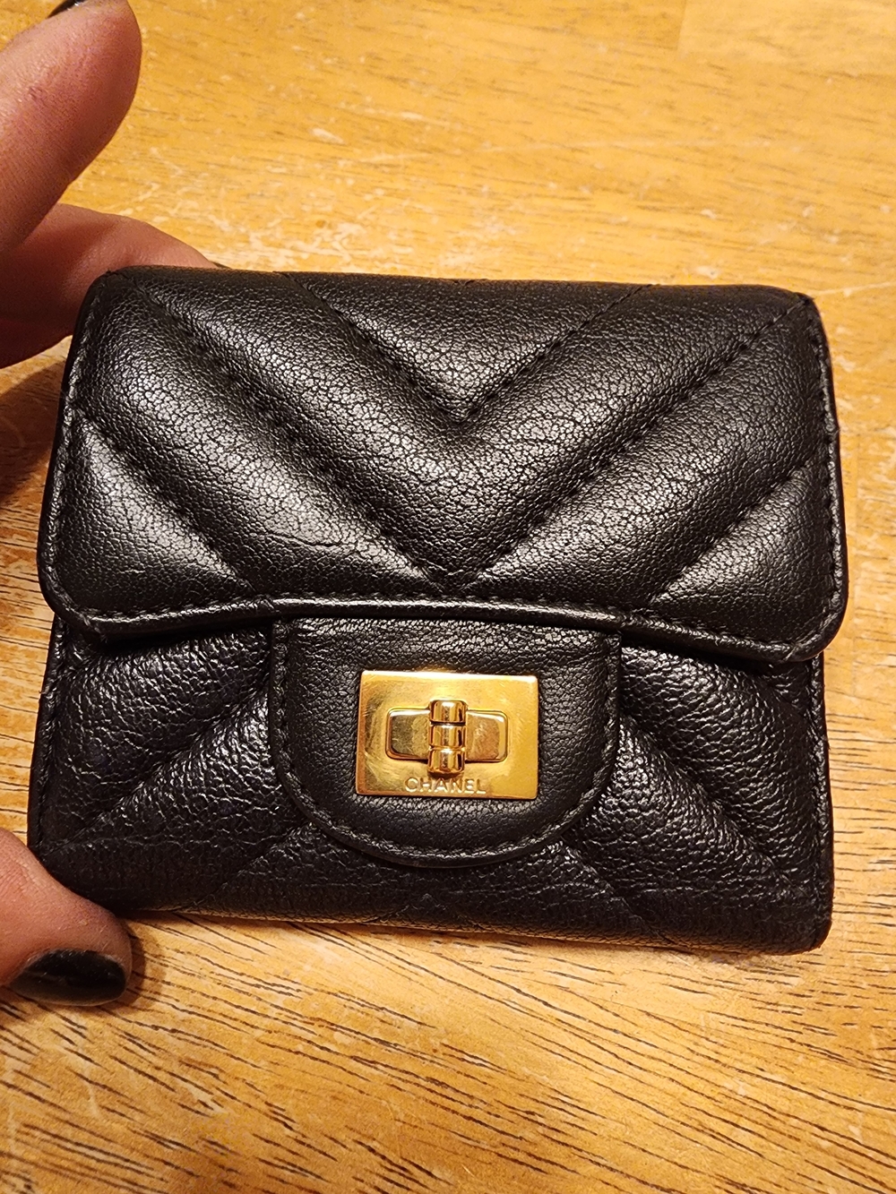 black quilted leather Chanel 2.55 Reissue compact wallet